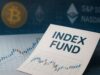 You’re in Crypto. Whether You Like It or Not Close-up of an index fund investment document placed over financial charts, with faded Bitcoin and Ethereum symbols in the background alongside S&P 500 and Nasdaq references, illustrating indirect crypto exposure via index funds.