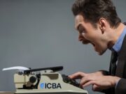 Inside ICBA’s Case Against Coinbase’s Trust Charter — and Why Coinbase Calls It Protectionism Legal clerk typing a letter on an old fashioned typewriter with ICBA logo, screaming as he drafts his letter to the OCC.